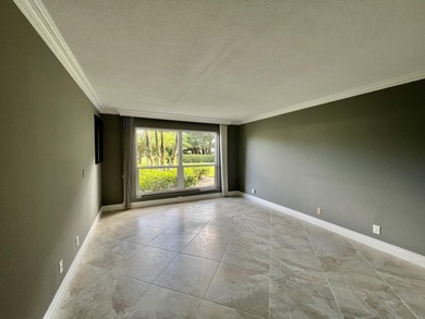 Beautifully renovated 2-bedroom, 2-bath 1st floor corner on Quail Ridge Golf Course and Country Club in Florida - for sale on GolfHomes.com, golf home, golf lot