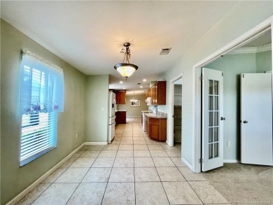 This home truly has it all! 3 bedrooms/2 bath + bonus room on Indianwood Golf and Country Club in Florida - for sale on GolfHomes.com, golf home, golf lot