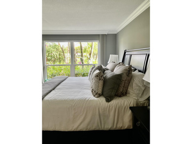 Beautifully renovated 2-bedroom, 2-bath 1st floor corner on Quail Ridge Golf Course and Country Club in Florida - for sale on GolfHomes.com, golf home, golf lot