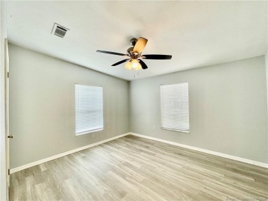 This home truly has it all! 3 bedrooms/2 bath + bonus room on Indianwood Golf and Country Club in Florida - for sale on GolfHomes.com, golf home, golf lot