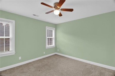 PRICE IMPROVEMENT to reflect cosmetic updates needed. GET INTO on Sedgefield Golf Course in North Carolina - for sale on GolfHomes.com, golf home, golf lot