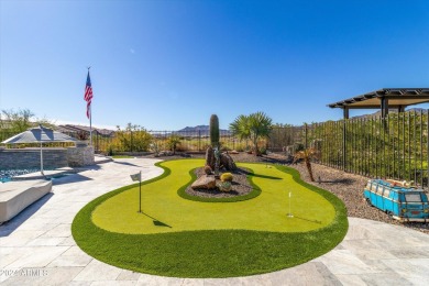 Discover unparalleled luxury in this David Weekley home, located on Verrado Golf Club - Victory in Arizona - for sale on GolfHomes.com, golf home, golf lot