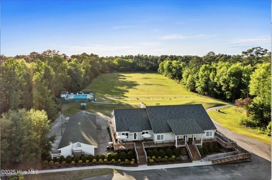 This inviting floor plan is designed for both comfort and on Harbour Point Golf Club in North Carolina - for sale on GolfHomes.com, golf home, golf lot