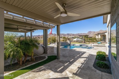 Discover unparalleled luxury in this David Weekley home, located on Verrado Golf Club - Victory in Arizona - for sale on GolfHomes.com, golf home, golf lot