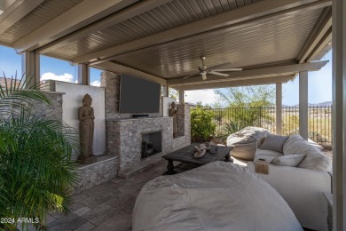 Discover unparalleled luxury in this David Weekley home, located on Verrado Golf Club - Victory in Arizona - for sale on GolfHomes.com, golf home, golf lot