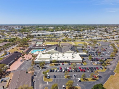 A rare Sun City Center find! This stunning balcony home has on Caloosa Greens Executive Golf Course in Florida - for sale on GolfHomes.com, golf home, golf lot