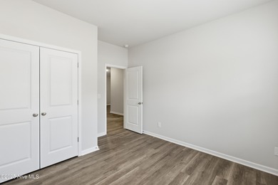 This inviting floor plan is designed for both comfort and on Harbour Point Golf Club in North Carolina - for sale on GolfHomes.com, golf home, golf lot