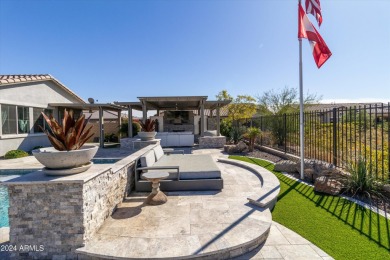 Discover unparalleled luxury in this David Weekley home, located on Verrado Golf Club - Victory in Arizona - for sale on GolfHomes.com, golf home, golf lot