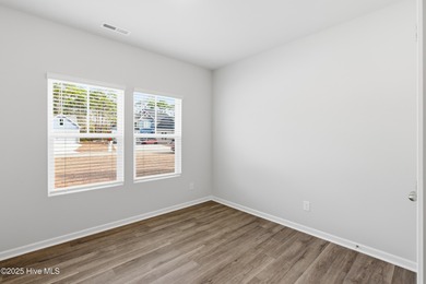 This inviting floor plan is designed for both comfort and on Harbour Point Golf Club in North Carolina - for sale on GolfHomes.com, golf home, golf lot