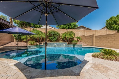 This pool home has new paint throughout the interior, custom on Verrado Golf Club  in Arizona - for sale on GolfHomes.com, golf home, golf lot