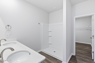 This inviting floor plan is designed for both comfort and on Harbour Point Golf Club in North Carolina - for sale on GolfHomes.com, golf home, golf lot