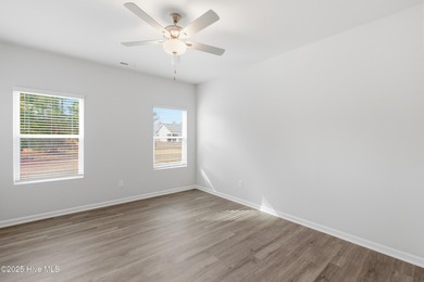 This inviting floor plan is designed for both comfort and on Harbour Point Golf Club in North Carolina - for sale on GolfHomes.com, golf home, golf lot