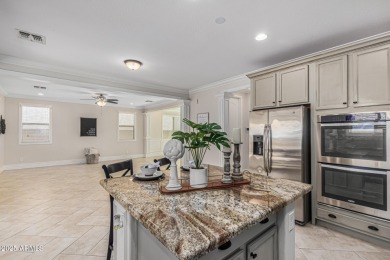 This pool home has new paint throughout the interior, custom on Verrado Golf Club  in Arizona - for sale on GolfHomes.com, golf home, golf lot