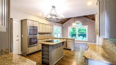 This Andover Forest brick home on a finished basement is full of on Andover Golf and Country Club in Kentucky - for sale on GolfHomes.com, golf home, golf lot