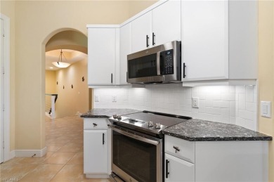 RARELY AVAILABLE COACH HOME WITH GOLF COURSE VIEWS IN THE on Vineyards Golf and Country Club in Florida - for sale on GolfHomes.com, golf home, golf lot