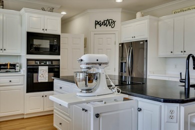 This extraordinary 3BR, 3.5BA custom brick is sure to impress on Woodside Plantation Country Club in South Carolina - for sale on GolfHomes.com, golf home, golf lot