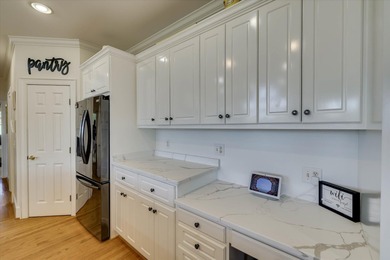 This extraordinary 3BR, 3.5BA custom brick is sure to impress on Woodside Plantation Country Club in South Carolina - for sale on GolfHomes.com, golf home, golf lot