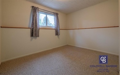 Welcome to this well-maintained 4-bedroom, 2-bath home ideally on Olive Glenn Golf and Country Club in Wyoming - for sale on GolfHomes.com, golf home, golf lot