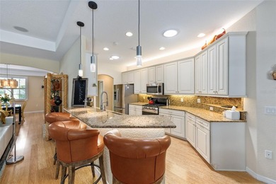 FAR FROM ORDINARY! Beautiful Extended Jacaranda Model (500 sf on Summerglen Country Club in Florida - for sale on GolfHomes.com, golf home, golf lot