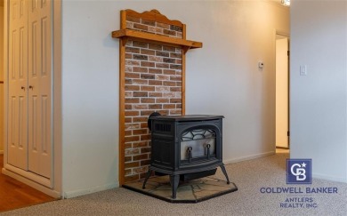 Welcome to this well-maintained 4-bedroom, 2-bath home ideally on Olive Glenn Golf and Country Club in Wyoming - for sale on GolfHomes.com, golf home, golf lot