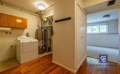 Welcome to this well-maintained 4-bedroom, 2-bath home ideally on Olive Glenn Golf and Country Club in Wyoming - for sale on GolfHomes.com, golf home, golf lot