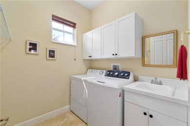 RARELY AVAILABLE COACH HOME WITH GOLF COURSE VIEWS IN THE on Vineyards Golf and Country Club in Florida - for sale on GolfHomes.com, golf home, golf lot
