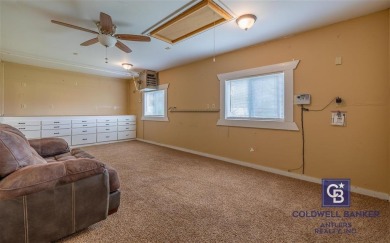 Welcome to this well-maintained 4-bedroom, 2-bath home ideally on Olive Glenn Golf and Country Club in Wyoming - for sale on GolfHomes.com, golf home, golf lot