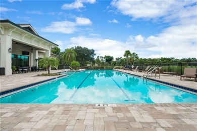 RARELY AVAILABLE COACH HOME WITH GOLF COURSE VIEWS IN THE on Vineyards Golf and Country Club in Florida - for sale on GolfHomes.com, golf home, golf lot