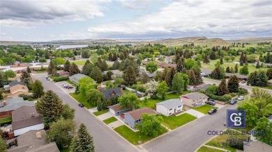 Welcome to this well-maintained 4-bedroom, 2-bath home ideally on Olive Glenn Golf and Country Club in Wyoming - for sale on GolfHomes.com, golf home, golf lot