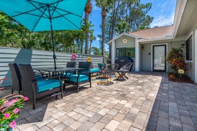 Immaculate 2BR/2BA End Unit with Golf Course Views on a Quiet on The Club At Pelican Bay - North Course in Florida - for sale on GolfHomes.com, golf home, golf lot