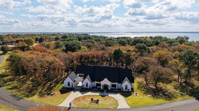 Stunning 2023 custom one-story home on a beautifully treed on Cedar Creek Country Club in Texas - for sale on GolfHomes.com, golf home, golf lot