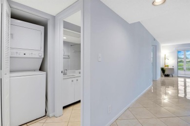 This top-floor condo is situated in Wynmoor's golf community and on Wynmoor Golf Course in Florida - for sale on GolfHomes.com, golf home, golf lot