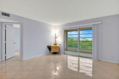 This top-floor condo is situated in Wynmoor's golf community and on Wynmoor Golf Course in Florida - for sale on GolfHomes.com, golf home, golf lot