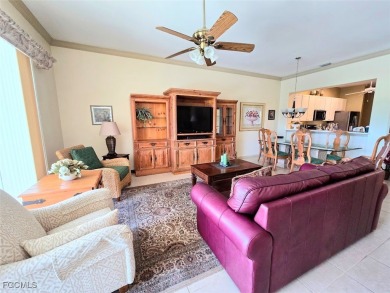 This beautifully maintained south-facing attached villa is on Fiddlesticks Country Club in Florida - for sale on GolfHomes.com, golf home, golf lot