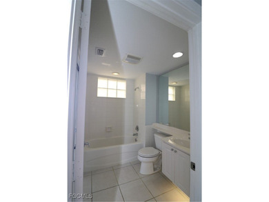 Welcome to this beautifully appointed 4-bedroom, 3-bath townhome on Palmira Golf and Country Club in Florida - for sale on GolfHomes.com, golf home, golf lot