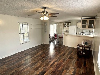 A charming home in the desirable Hidden Golf Community. Welcome on Lake Henry Golf Club in Florida - for sale on GolfHomes.com, golf home, golf lot
