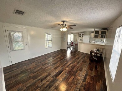 A charming home in the desirable Hidden Golf Community. Welcome on Lake Henry Golf Club in Florida - for sale on GolfHomes.com, golf home, golf lot