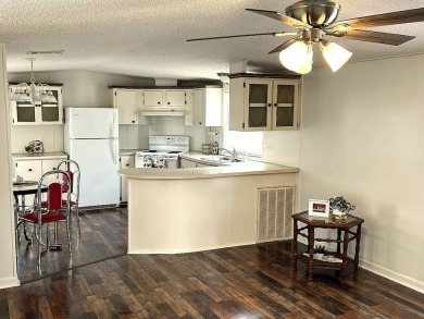 A charming home in the desirable Hidden Golf Community. Welcome on Lake Henry Golf Club in Florida - for sale on GolfHomes.com, golf home, golf lot