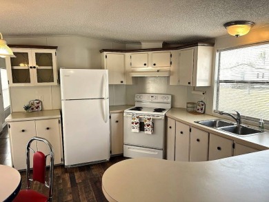 A charming home in the desirable Hidden Golf Community. Welcome on Lake Henry Golf Club in Florida - for sale on GolfHomes.com, golf home, golf lot