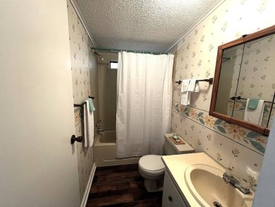 A charming home in the desirable Hidden Golf Community. Welcome on Lake Henry Golf Club in Florida - for sale on GolfHomes.com, golf home, golf lot
