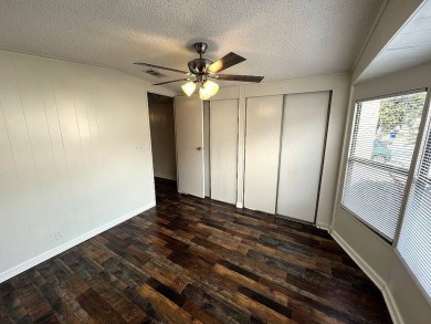 A charming home in the desirable Hidden Golf Community. Welcome on Lake Henry Golf Club in Florida - for sale on GolfHomes.com, golf home, golf lot