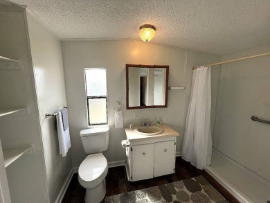A charming home in the desirable Hidden Golf Community. Welcome on Lake Henry Golf Club in Florida - for sale on GolfHomes.com, golf home, golf lot