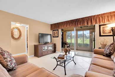 Discover unparalleled elegance and functionality in this on Wynmoor Golf Course in Florida - for sale on GolfHomes.com, golf home, golf lot