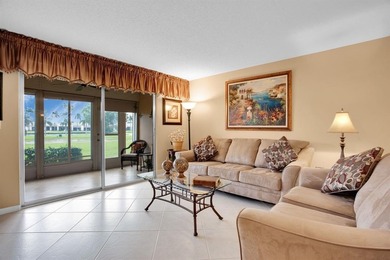 Discover unparalleled elegance and functionality in this on Wynmoor Golf Course in Florida - for sale on GolfHomes.com, golf home, golf lot