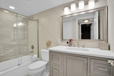 Discover unparalleled elegance and functionality in this on Wynmoor Golf Course in Florida - for sale on GolfHomes.com, golf home, golf lot
