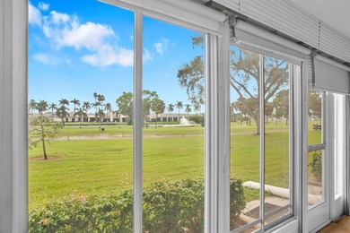 Discover unparalleled elegance and functionality in this on Wynmoor Golf Course in Florida - for sale on GolfHomes.com, golf home, golf lot