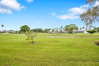 Discover unparalleled elegance and functionality in this on Wynmoor Golf Course in Florida - for sale on GolfHomes.com, golf home, golf lot