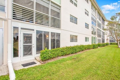 Discover unparalleled elegance and functionality in this on Wynmoor Golf Course in Florida - for sale on GolfHomes.com, golf home, golf lot