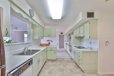 WELCOME TO YOUR CHARMING, FRESHELY PAINTED HOME- NO HOA on North Lakes Golf Course in Florida - for sale on GolfHomes.com, golf home, golf lot