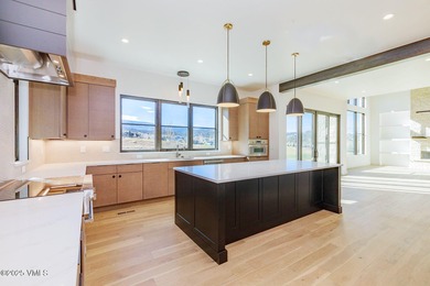 Welcome to 213 Harvester, a standout 4-bedroom with office on Eagle Ranch in Colorado - for sale on GolfHomes.com, golf home, golf lot